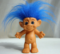 Blue-haired troll, similar to the one I had as a child. I named mine Tragen. To my best recollection, he was always naked!